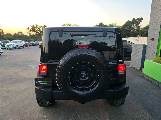 used 2014 Jeep Wrangler car, priced at $18,499