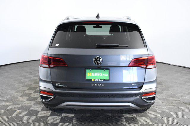 used 2023 Volkswagen Taos car, priced at $21,497