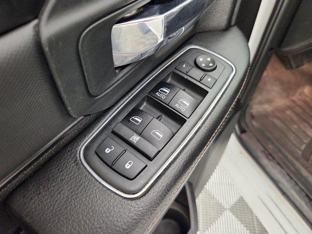 used 2018 Ram 1500 car, priced at $29,202