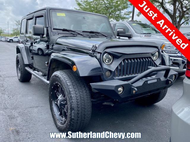 used 2013 Jeep Wrangler Unlimited car, priced at $10,498