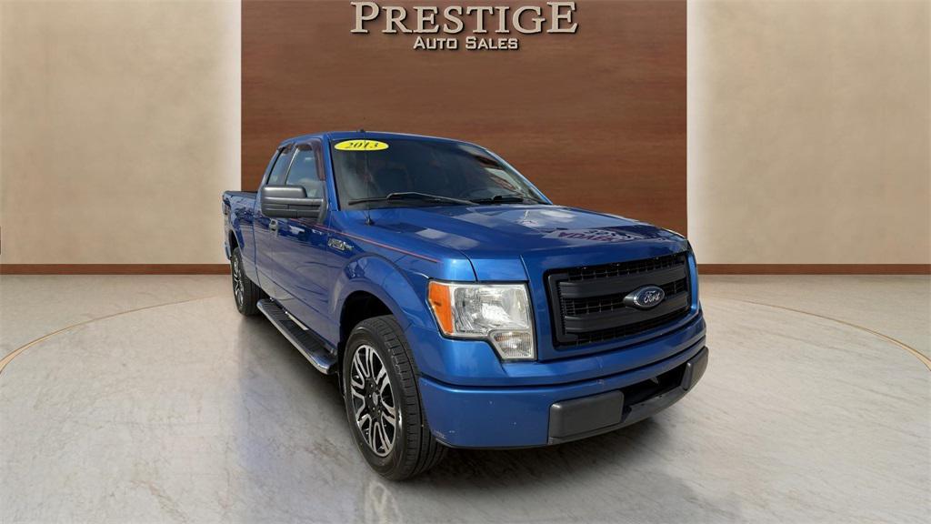used 2013 Ford F-150 car, priced at $14,000