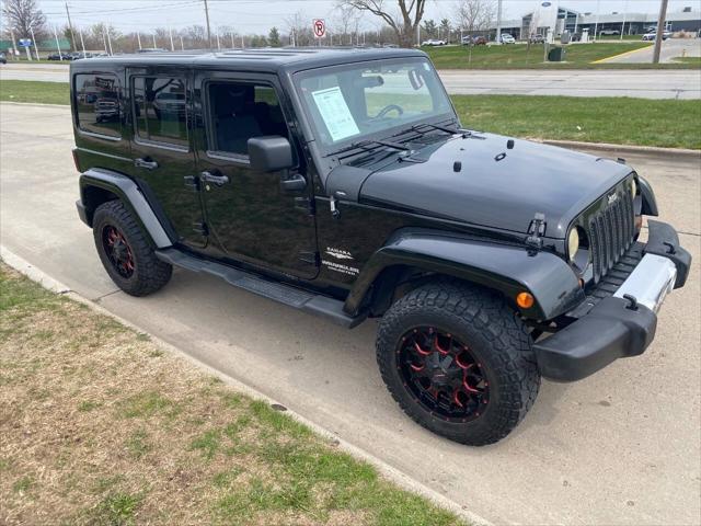 used 2011 Jeep Wrangler Unlimited car, priced at $15,900