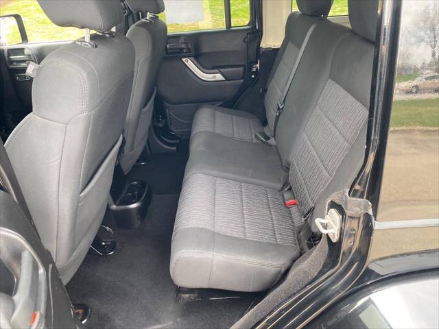 used 2011 Jeep Wrangler Unlimited car, priced at $15,900