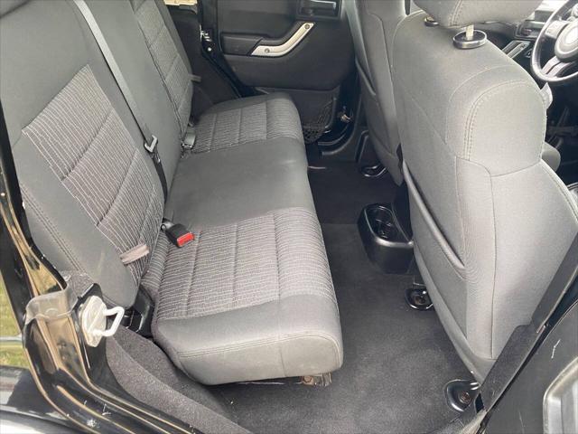 used 2011 Jeep Wrangler Unlimited car, priced at $15,900
