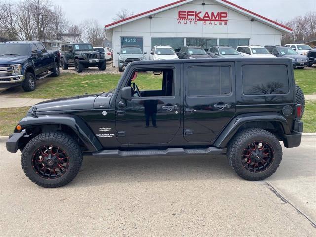 used 2011 Jeep Wrangler Unlimited car, priced at $15,900