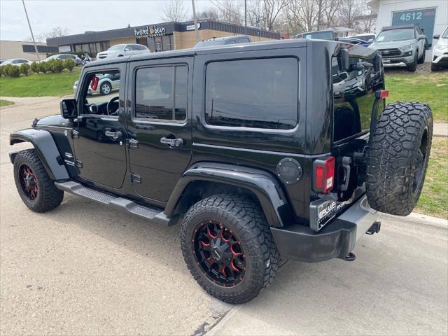 used 2011 Jeep Wrangler Unlimited car, priced at $15,900