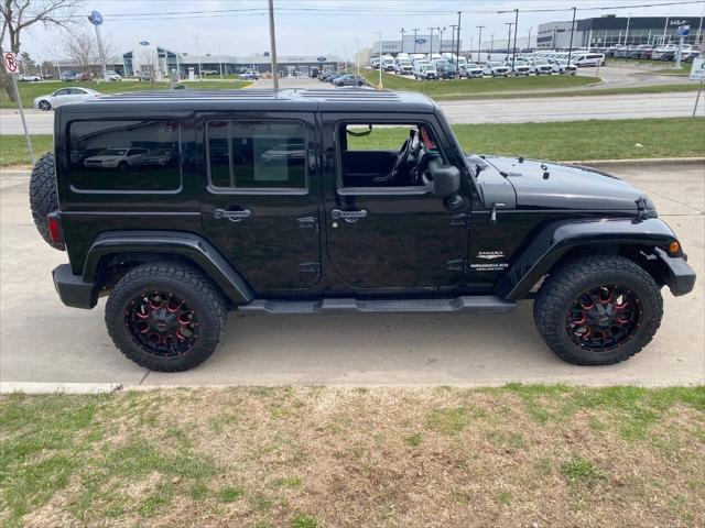 used 2011 Jeep Wrangler Unlimited car, priced at $15,900