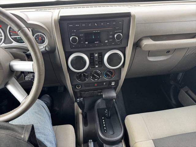 used 2010 Jeep Wrangler Unlimited car, priced at $14,900