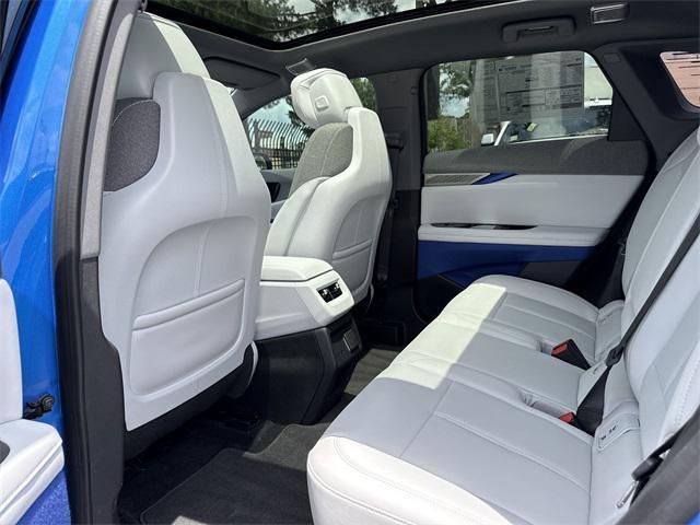 new 2025 Cadillac OPTIQ car, priced at $55,615