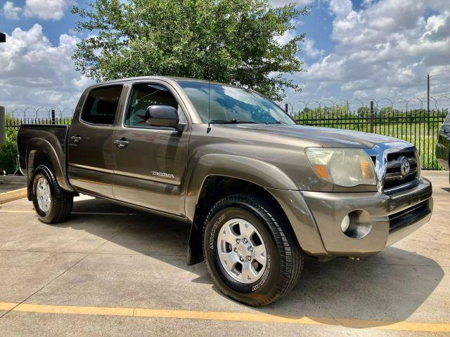 used 2009 Toyota Tacoma car, priced at $13,999