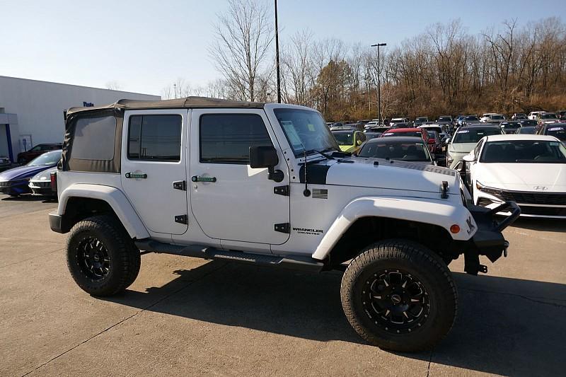 used 2011 Jeep Wrangler Unlimited car, priced at $14,990