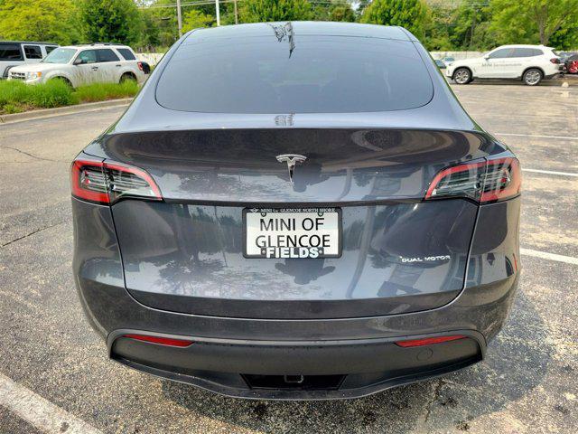 used 2023 Tesla Model Y car, priced at $30,995