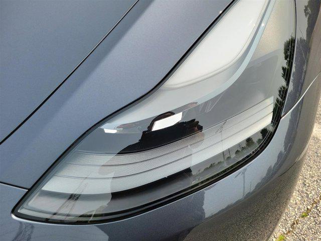 used 2023 Tesla Model Y car, priced at $30,995