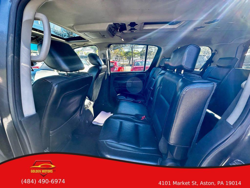 used 2010 Nissan Armada car, priced at $4,900