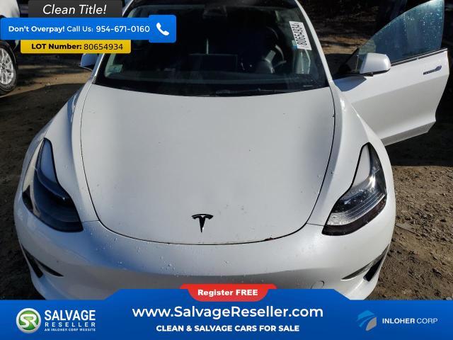 used 2023 Tesla Model 3 car, priced at $16,500