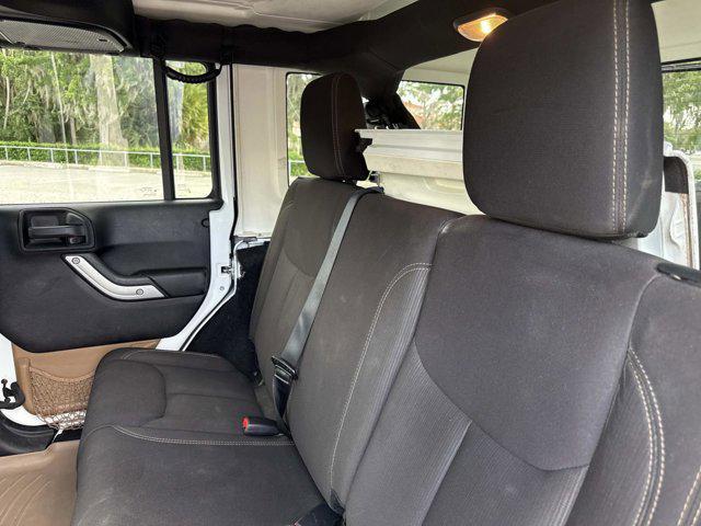 used 2015 Jeep Wrangler Unlimited car, priced at $19,900