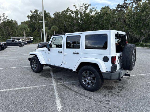 used 2015 Jeep Wrangler Unlimited car, priced at $19,900