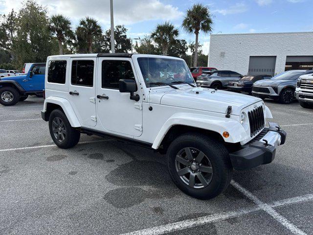 used 2015 Jeep Wrangler Unlimited car, priced at $19,999