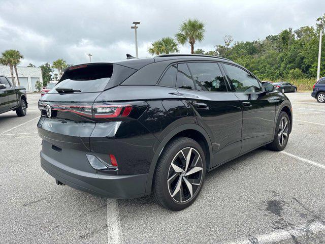 used 2023 Volkswagen ID.4 car, priced at $28,699