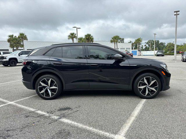 used 2023 Volkswagen ID.4 car, priced at $28,699