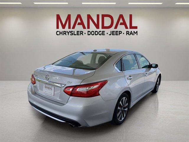 used 2017 Nissan Altima car, priced at $14,000