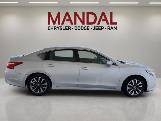 used 2017 Nissan Altima car, priced at $14,000