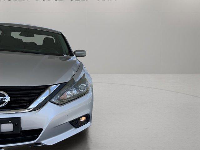 used 2017 Nissan Altima car, priced at $14,000