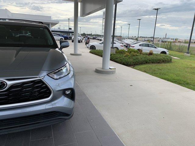 used 2021 Toyota Highlander car, priced at $30,000