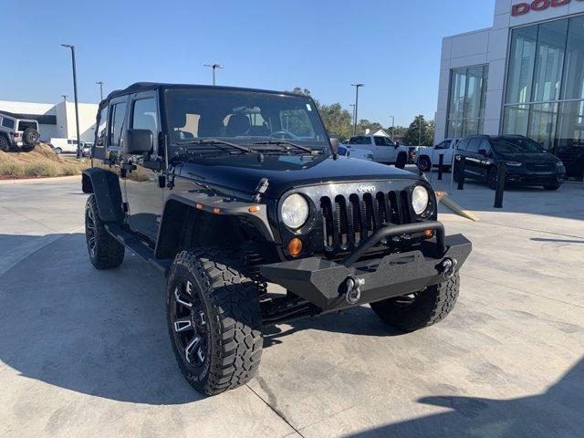 used 2012 Jeep Wrangler Unlimited car, priced at $15,000