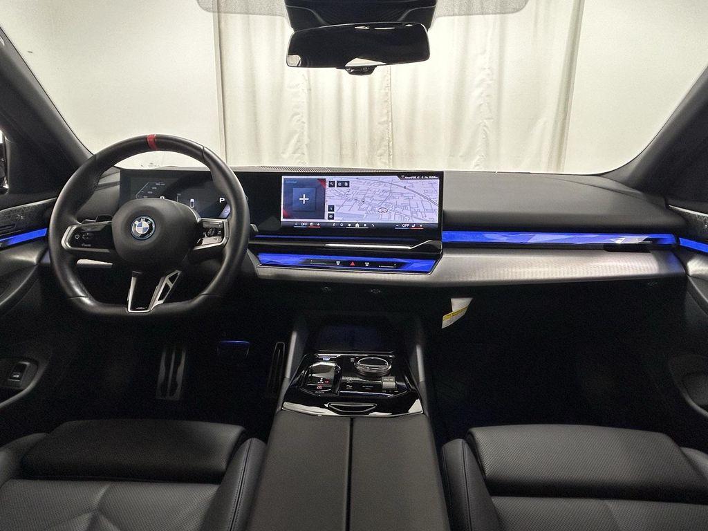 used 2024 BMW i5 car, priced at $65,987