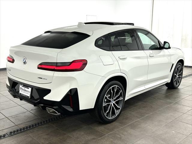used 2023 BMW X4 car, priced at $52,640
