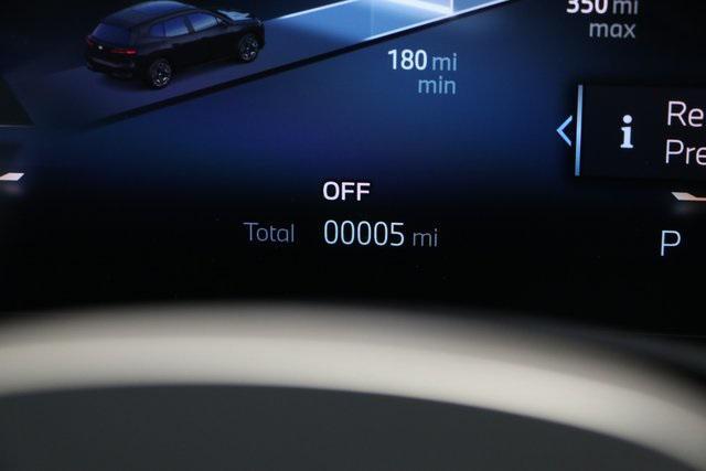 new 2025 BMW iX car, priced at $96,975
