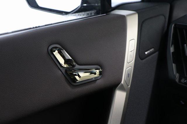 new 2025 BMW iX car, priced at $96,975
