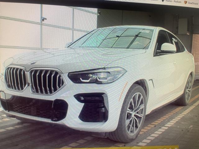 used 2023 BMW X6 car, priced at $65,900