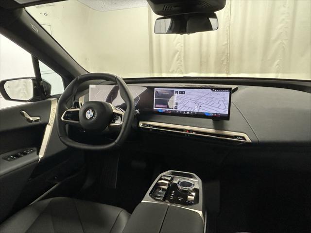new 2026 BMW iX car, priced at $85,560