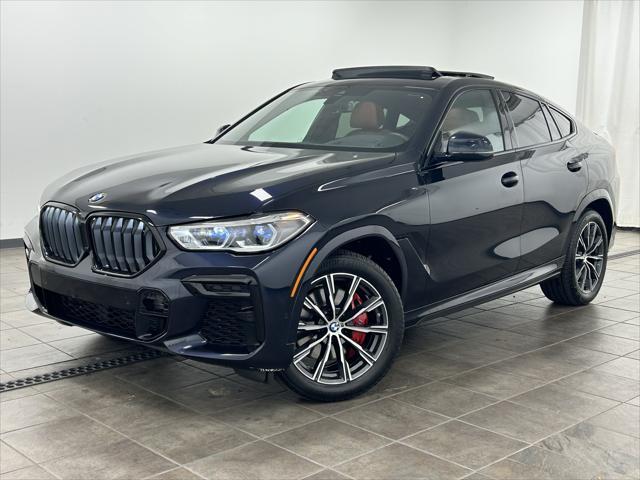 used 2023 BMW X6 car, priced at $57,201