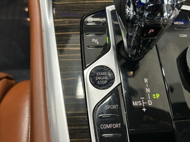 used 2023 BMW X6 car, priced at $57,201