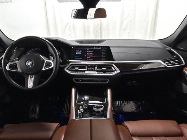 used 2023 BMW X6 car, priced at $57,201