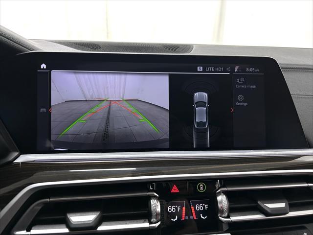 used 2023 BMW X6 car, priced at $57,201