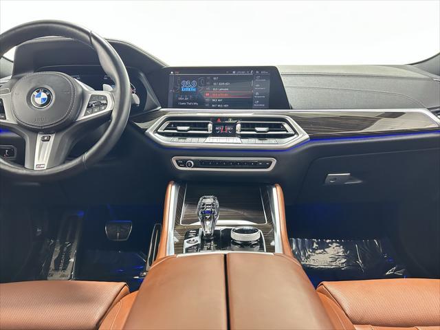 used 2023 BMW X6 car, priced at $57,201