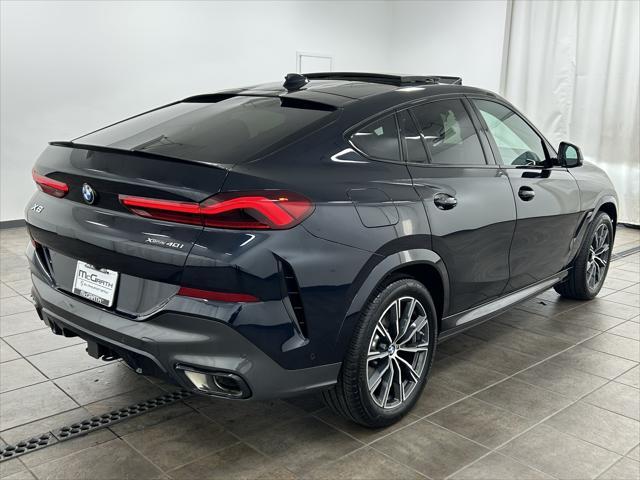 used 2023 BMW X6 car, priced at $57,201