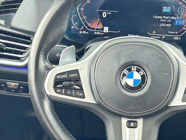 used 2023 BMW X6 car, priced at $57,201