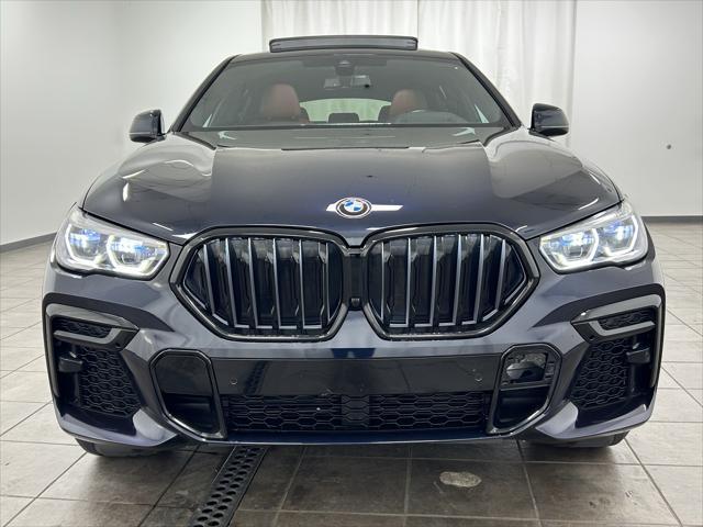 used 2023 BMW X6 car, priced at $57,201