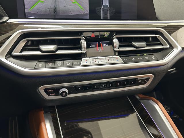 used 2023 BMW X6 car, priced at $57,201