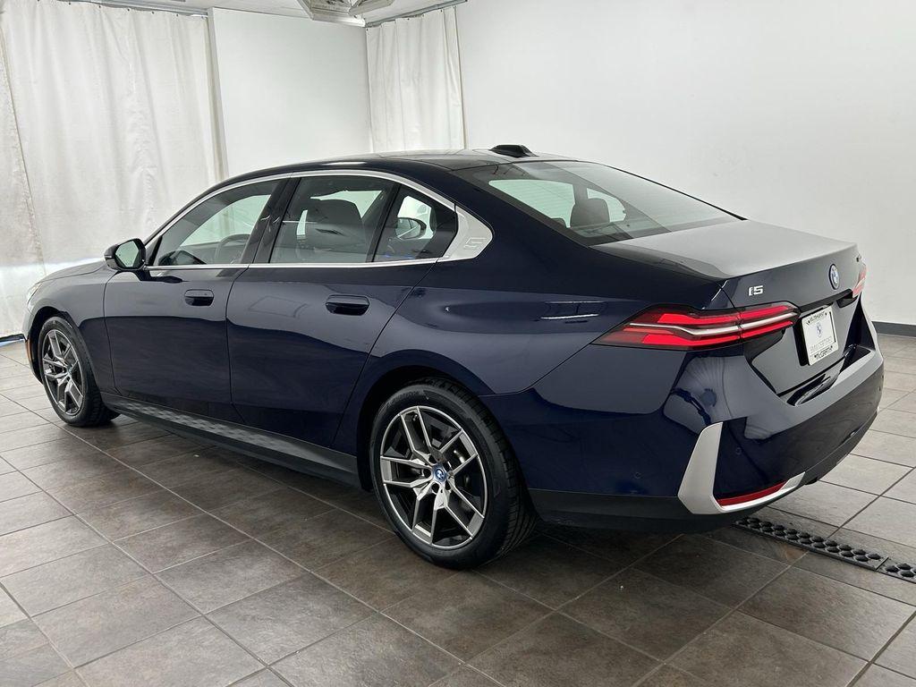 used 2024 BMW i5 car, priced at $54,995