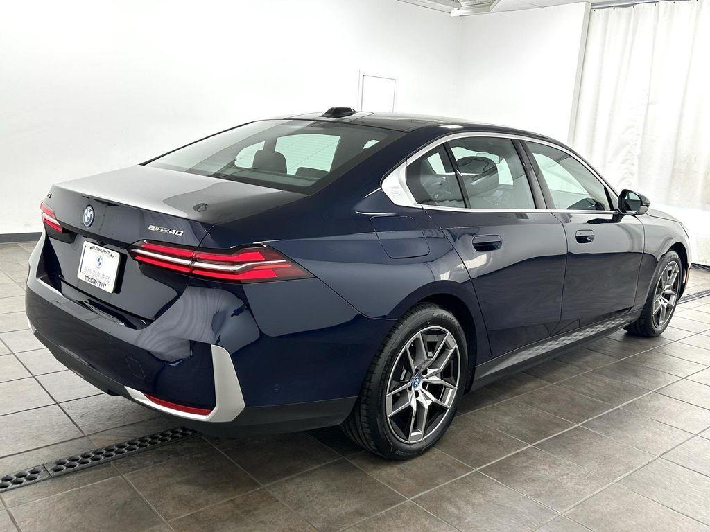 used 2024 BMW i5 car, priced at $54,995