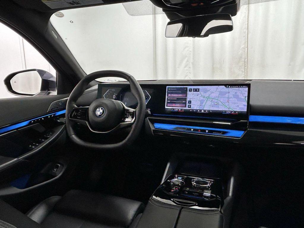 used 2024 BMW i5 car, priced at $54,995