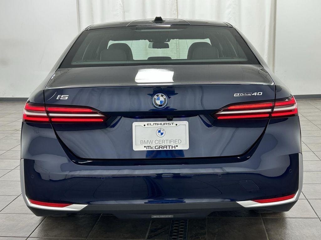 used 2024 BMW i5 car, priced at $54,995