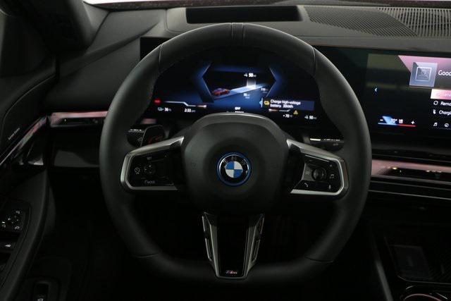 new 2025 BMW i5 car, priced at $78,670