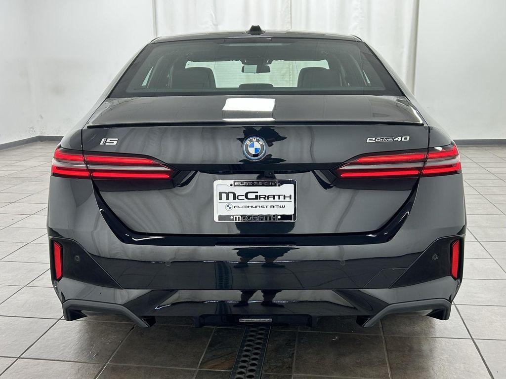 used 2024 BMW i5 car, priced at $55,995